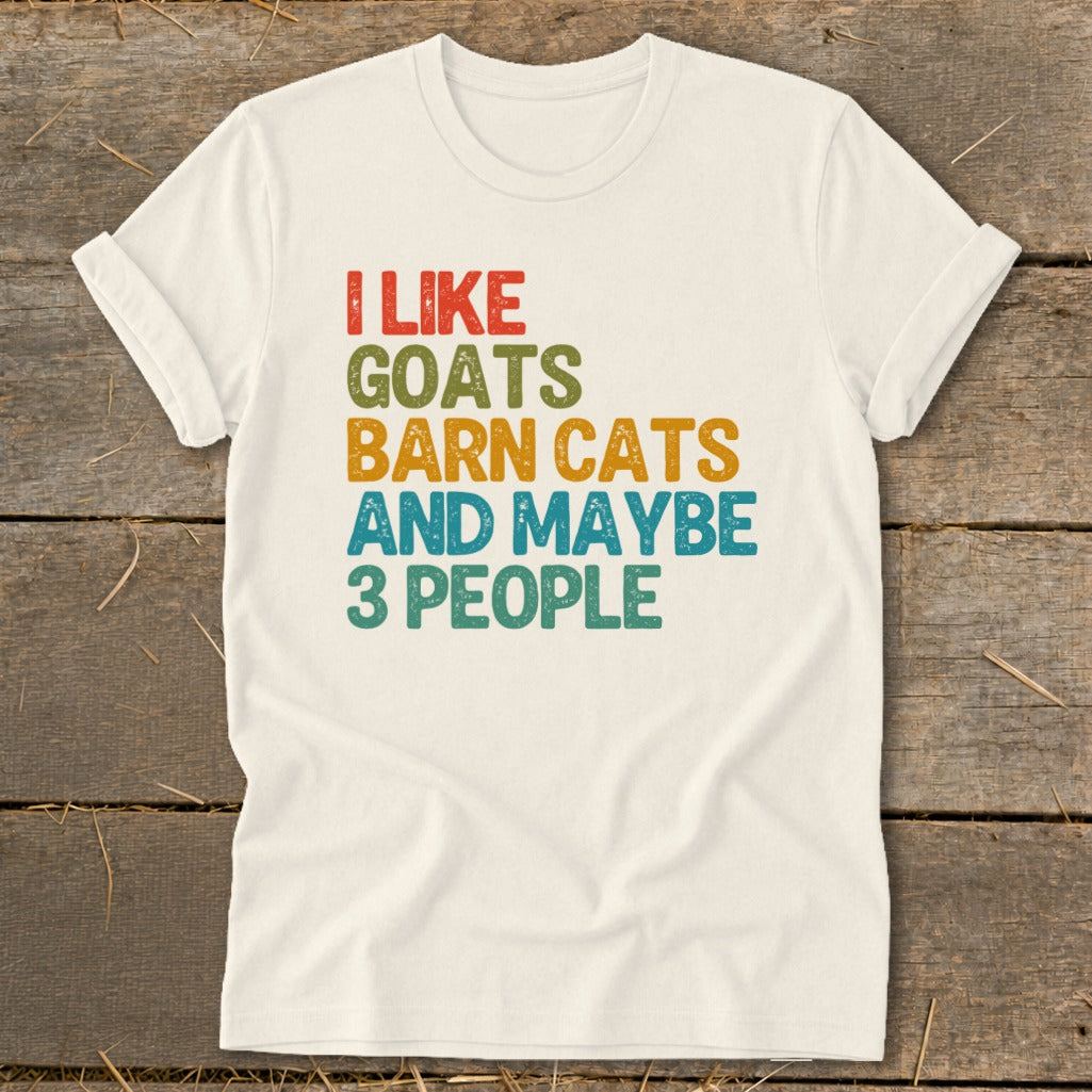 Cream t-shirt with text "I like goats, barn cats, and maybe 3 people."