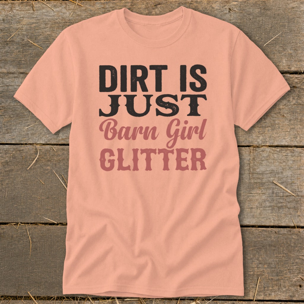 Peach t-shirt with black and pink text "Dirt is Just Barn Girl Glitter".