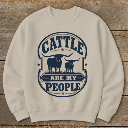 Crewneck sweatshirt with a circular graphic that reads "Cattle are my people."