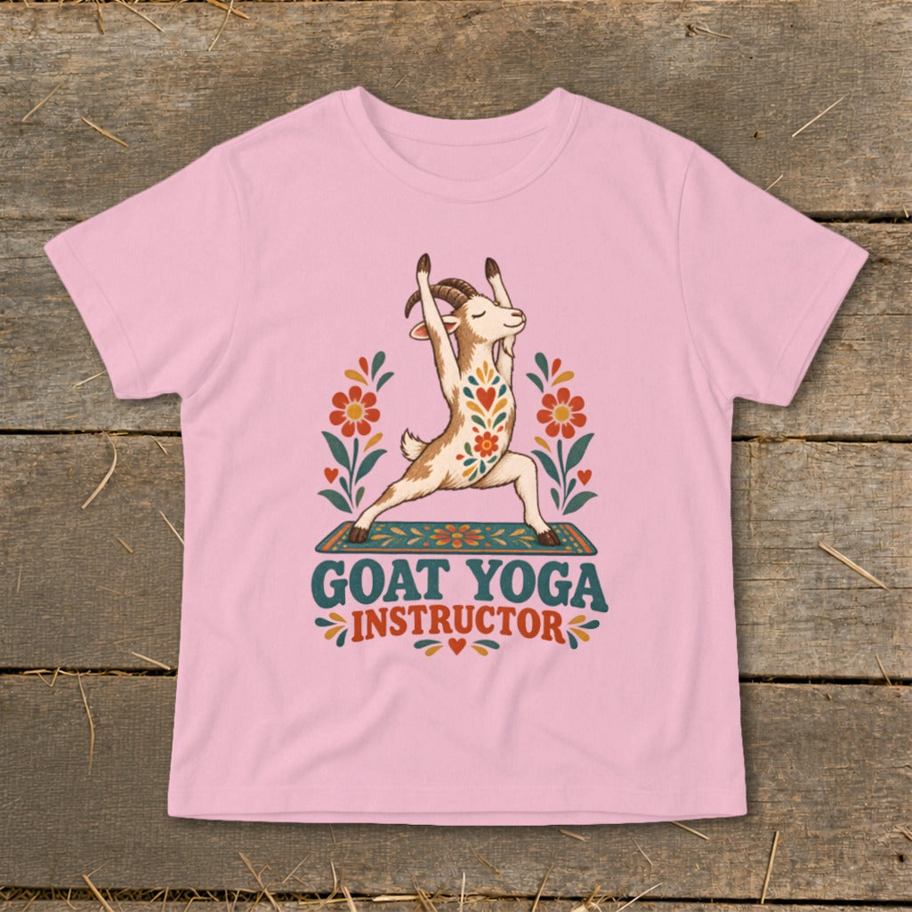 Pink t-shirt with a goat doing yoga, surrounded by flowers, and text "GOAT YOGA INSTRUCTOR".