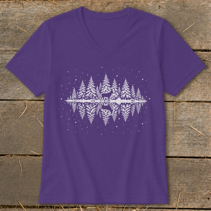 Purple v-neck t-shirt with a white silhouette of a deer and pine trees reflected in water.