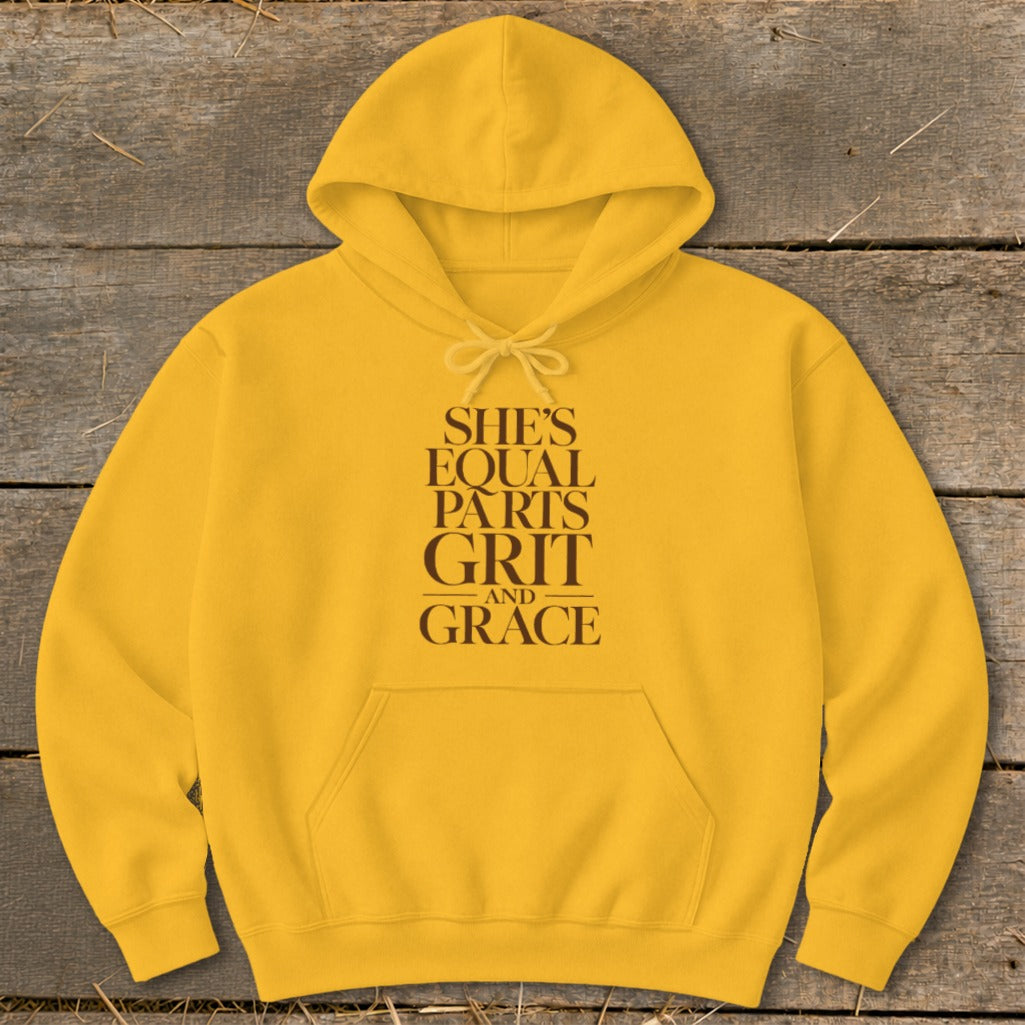 Yellow hoodie with text "She's Equal Parts Grit and Grace".