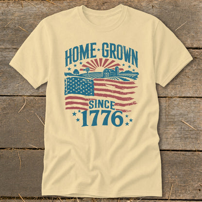 Cream t-shirt with "HOME GROWN SINCE 1776" text and a distressed American flag.