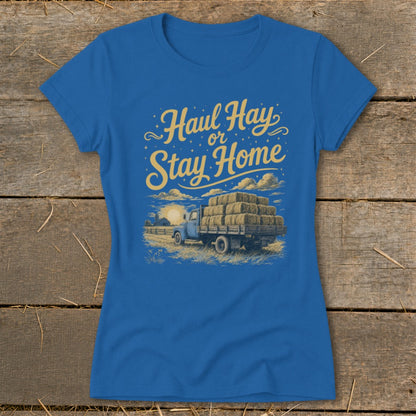 Blue t-shirt with "Haul Hay or Stay Home" text and truck with hay bales.