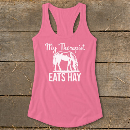 Pink tank top with white text and horse graphic: "My Therapist Eats Hay"