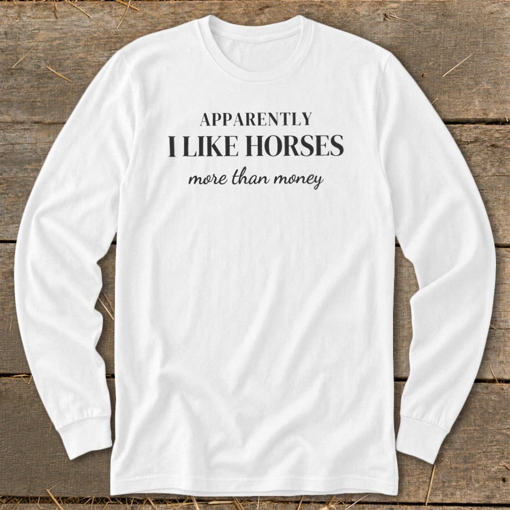 White long-sleeve shirt with "Apparently I Like Horses More Than Money" text.