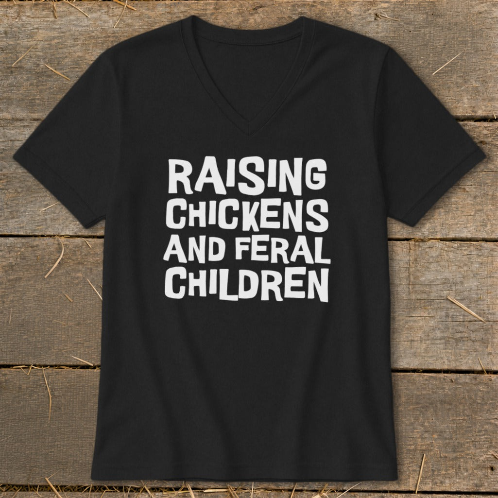 Black t-shirt with white text reading "Raising Chickens and Feral Children."