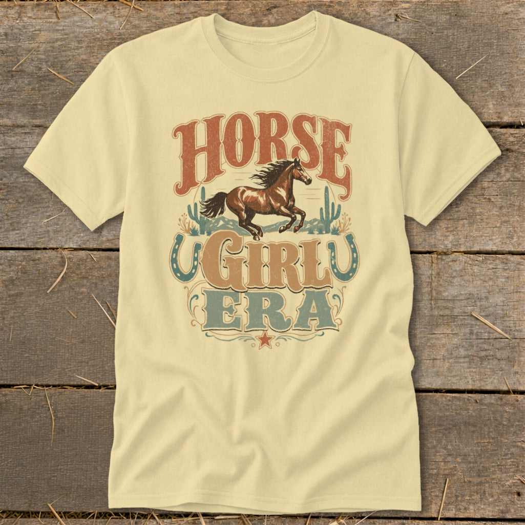Yellow t-shirt with "Horse Girl Era" text and a running horse graphic.