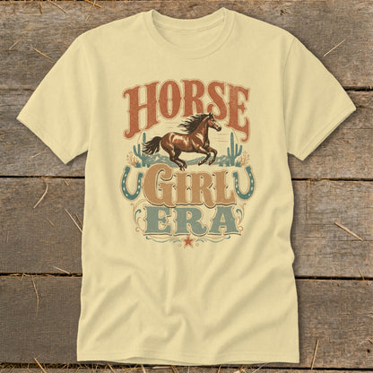 Yellow t-shirt with "Horse Girl Era" text and a running horse graphic.