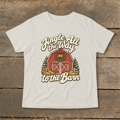 T-shirt graphic with red barn, Christmas wreath, and "Jingle All the Way to the Barn" text.