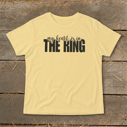 Yellow t-shirt with black text "my heart is in THE RING".