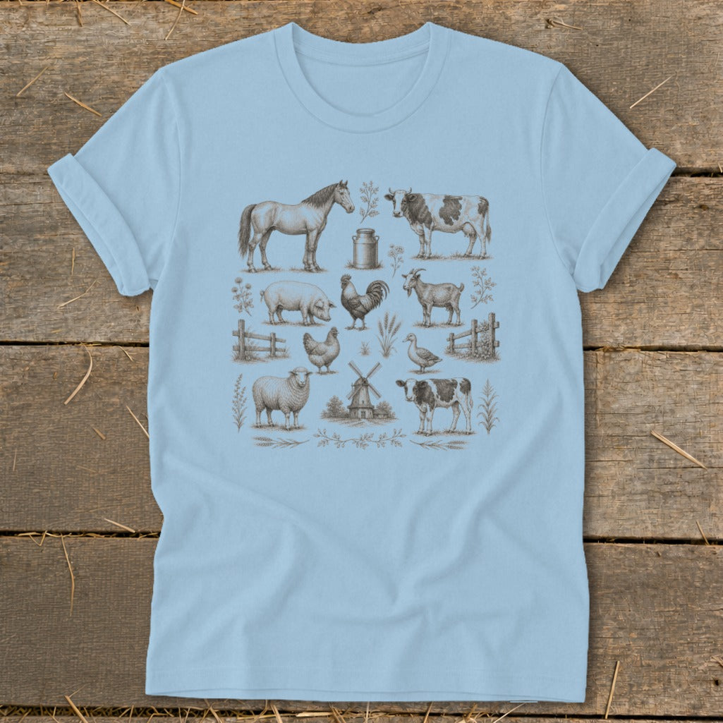 Light blue t-shirt with a vintage-style farm animal illustration pattern.