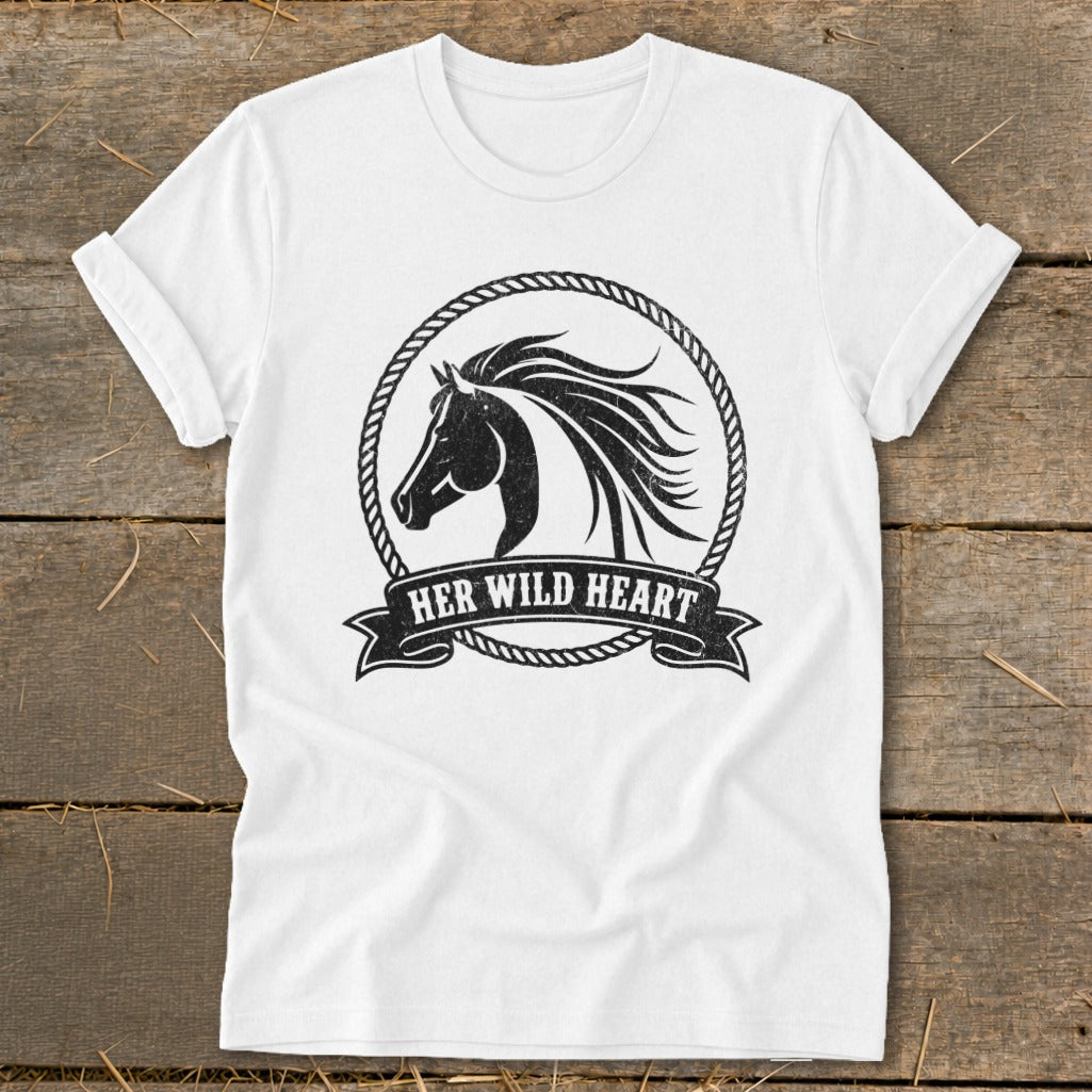 White t-shirt with a black distressed graphic of a horse's head inside a rope circle and the text "HER WILD HEART".