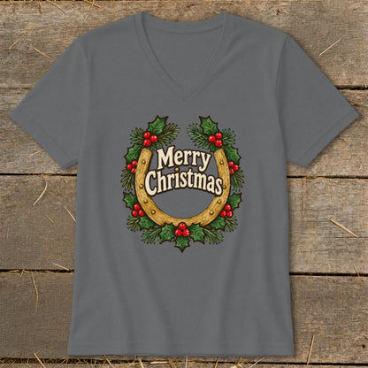 Grey v-neck t-shirt with a horseshoe, holly, and "Merry Christmas" text design.