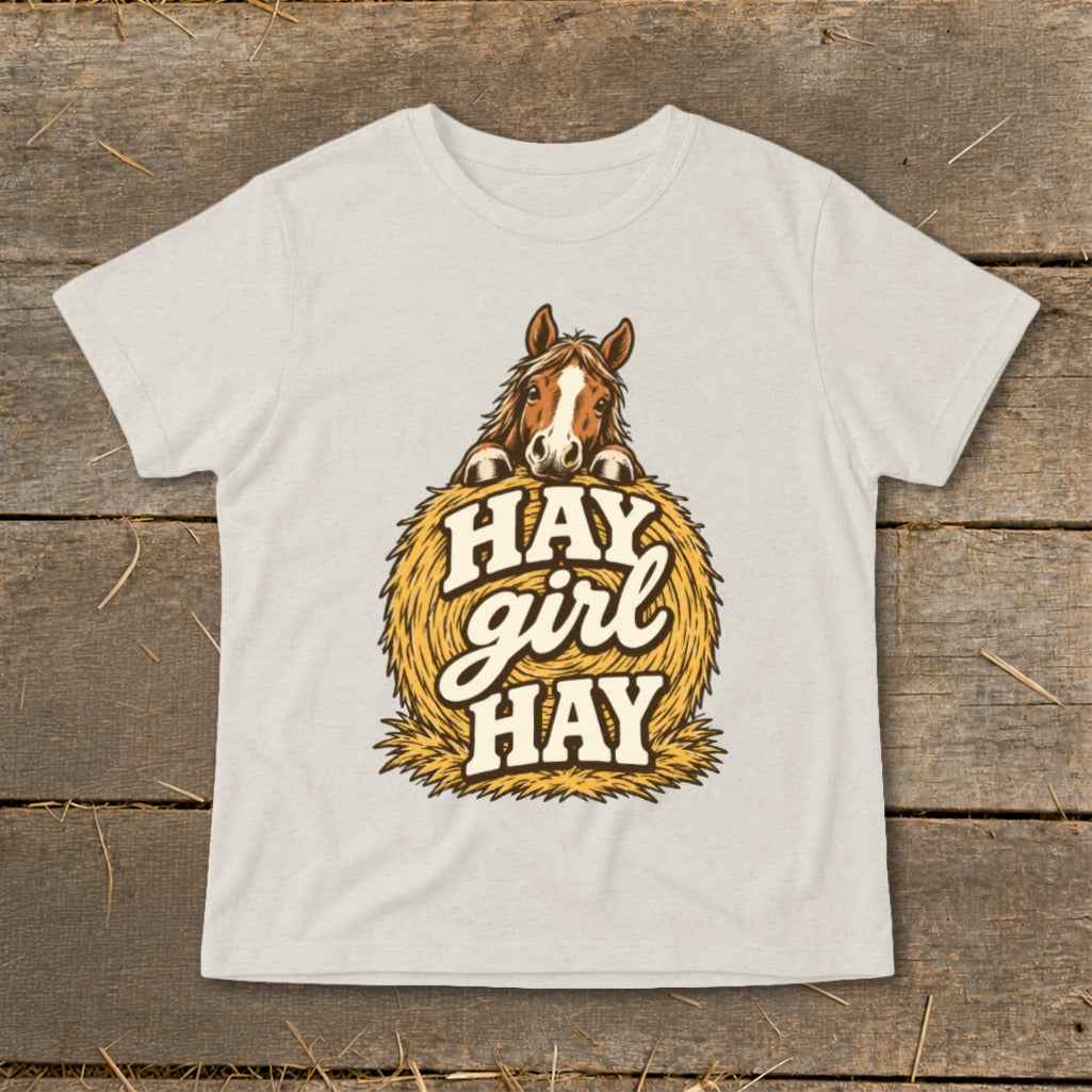 T-shirt with horse peeking over hay bale and text "Hay girl HAY."