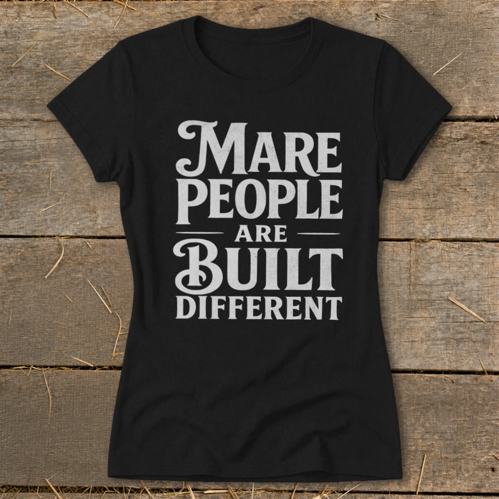Black t-shirt with white text: "Mare People Are Built Different"