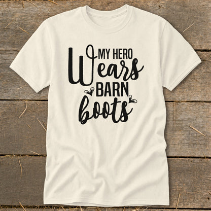 Cream t-shirt with "My Hero Wears Barn Boots" text in black script.
