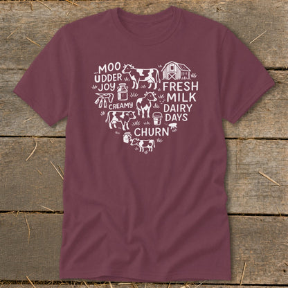 Maroon t-shirt with white heart-shaped farm graphic: cows, barn, milk jugs, and text.