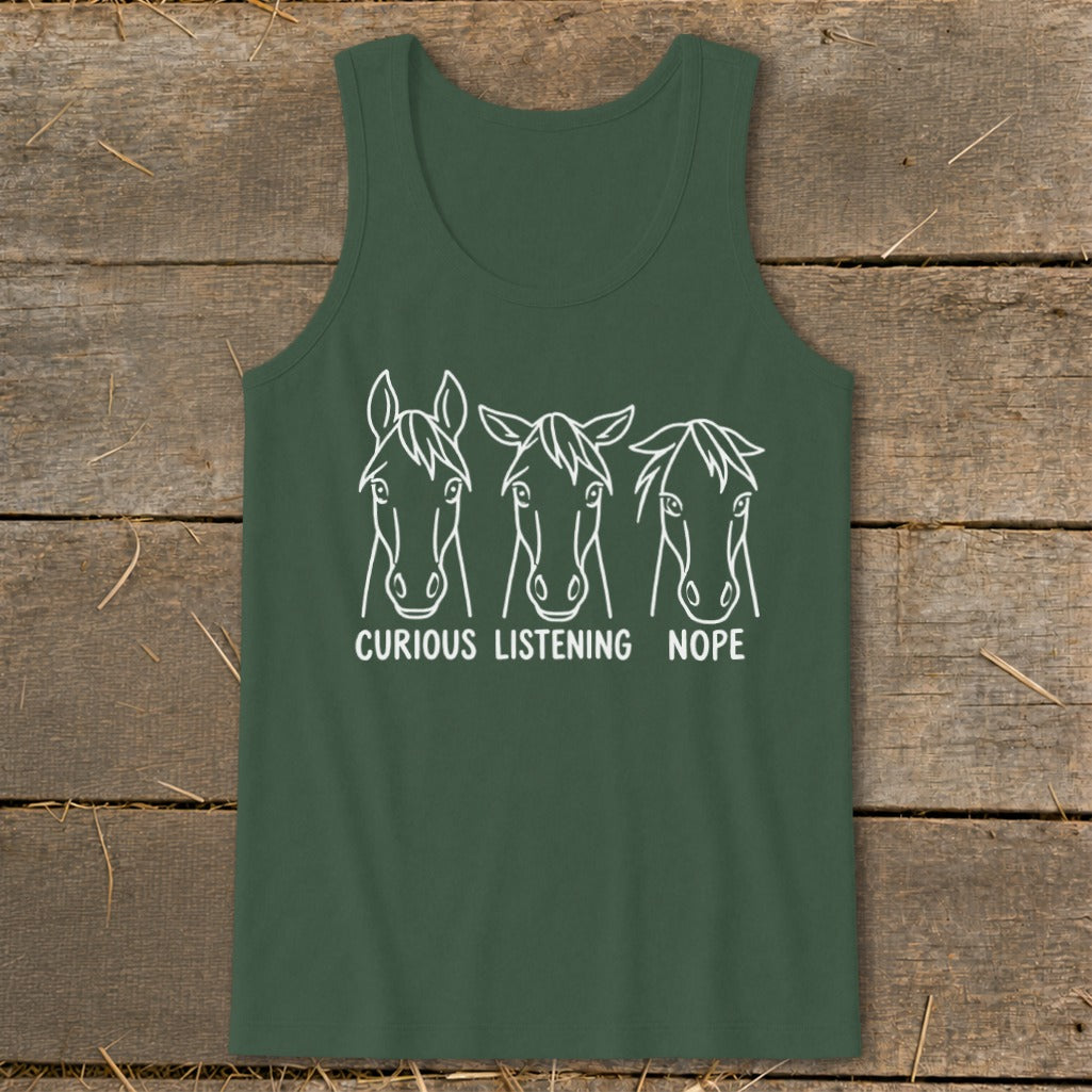 A dark green tank top featuring a white graphic of three horse heads with the text "CURIOUS," "LISTENING," and "NOPE."