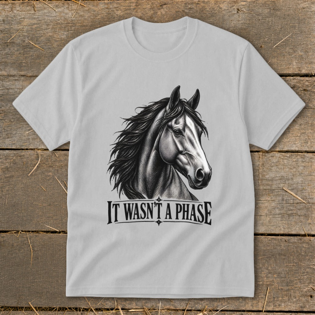 White t-shirt with black horse head sketch and text "IT WASN'T A PHASE".
