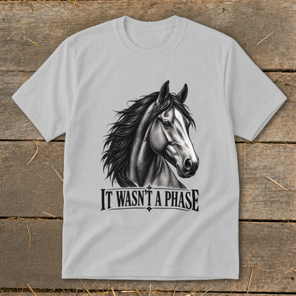 White t-shirt with black horse head sketch and text "IT WASN'T A PHASE".