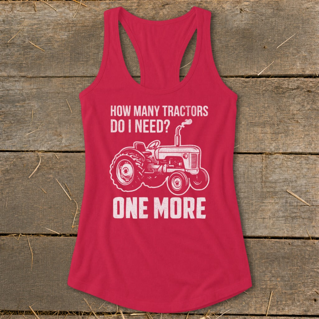 Red tank top with white text and tractor graphic: "How many tractors do I need? One more."