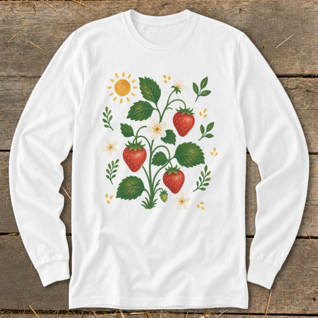 White long-sleeve shirt with strawberry plant, sun, and flower graphic.