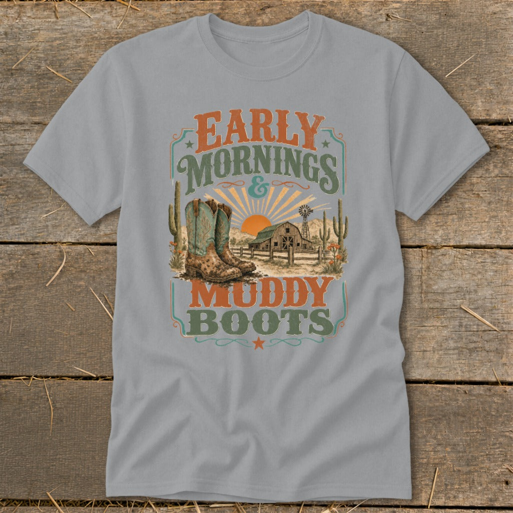 T-shirt graphic with cowboy boots, barn, cacti, and text "Early Mornings & Muddy Boots".