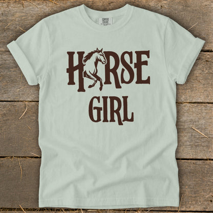 Light green t-shirt with dark brown "HORSE GIRL" text and a horse silhouette.