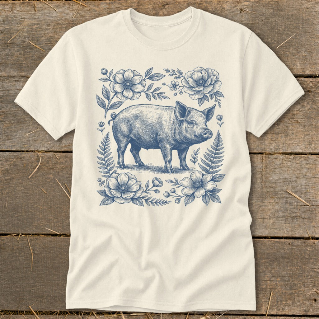 T-shirt with vintage blue floral illustration of a pig.
