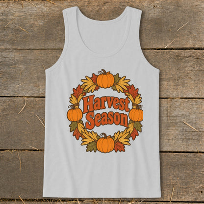 White tank top with pumpkins, leaves, and "Harvest Season" text in a circle.