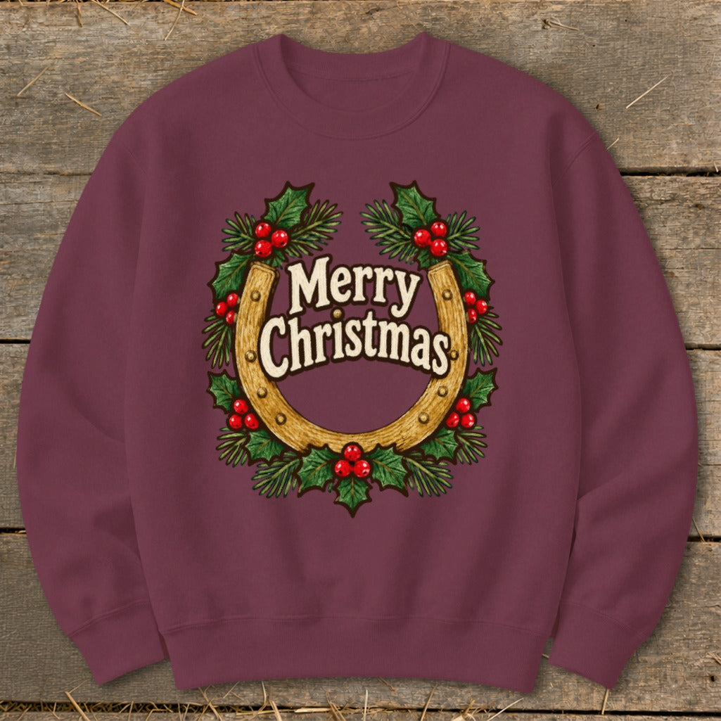Burgundy sweatshirt with a Christmas horseshoe and holly wreath graphic.