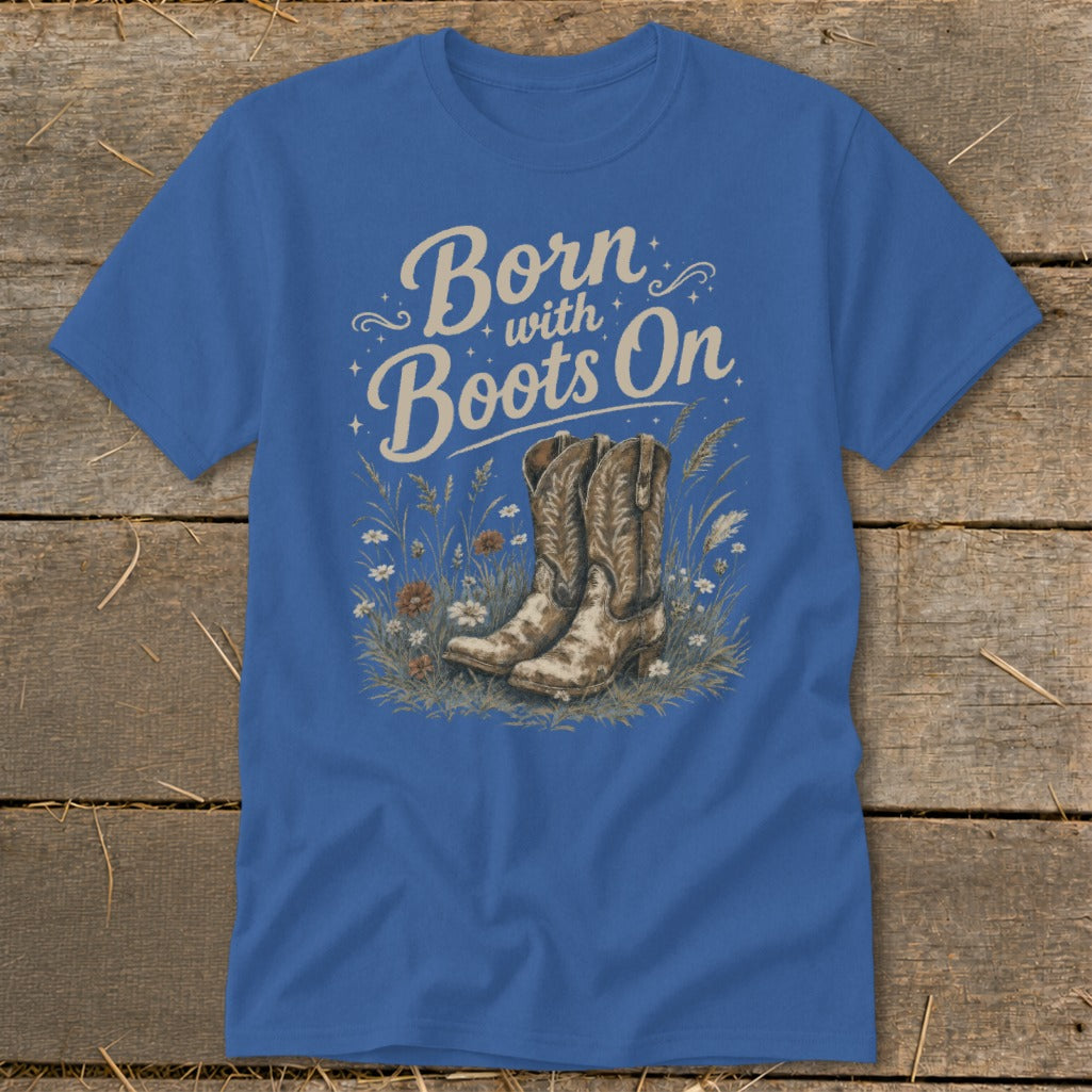Blue t-shirt with "Born with Boots On" text and cowboy boots in flowers.