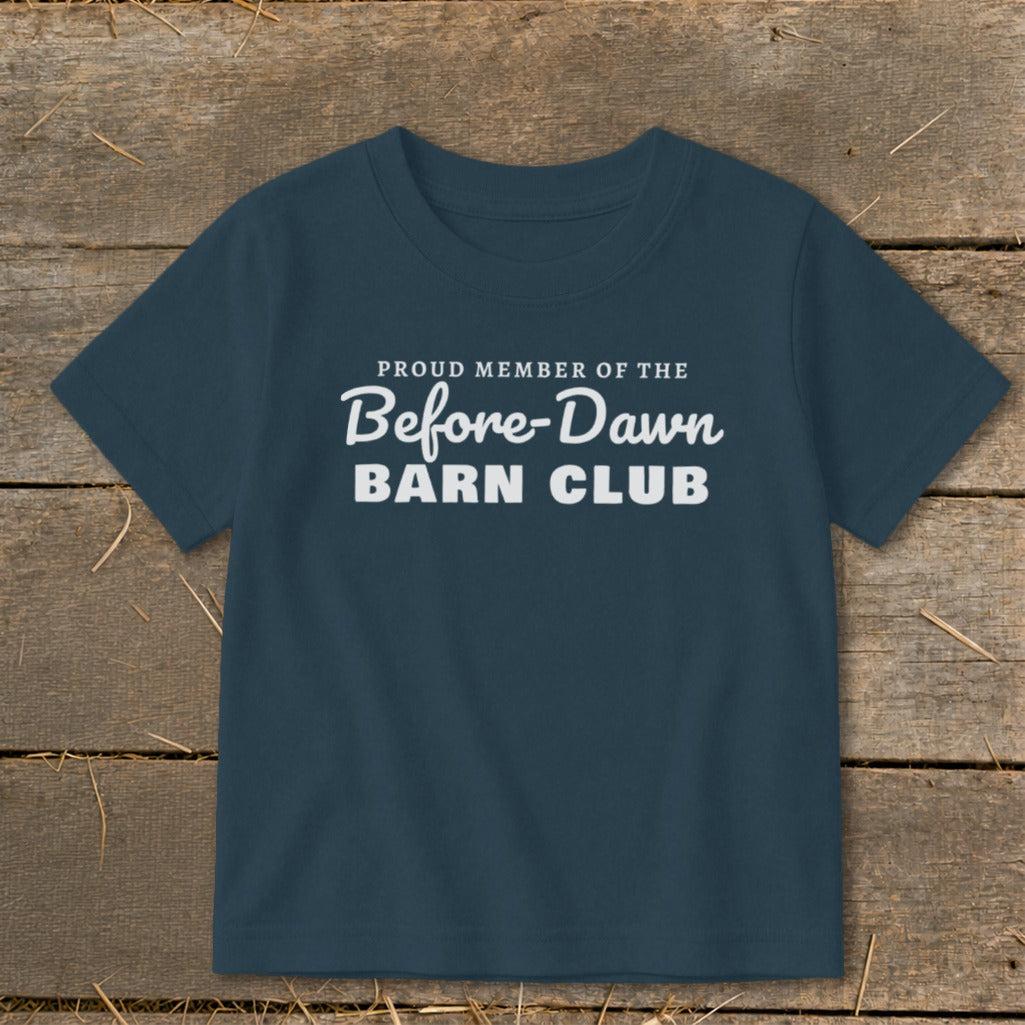 Dark blue t-shirt with white text: "PROUD MEMBER OF THE Before-Dawn BARN CLUB"