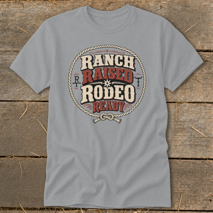 Gray t-shirt with "Ranch Raised Rodeo Ready" text inside a rope circle.