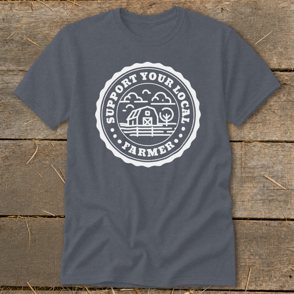 Dark grey t-shirt with white emblem reading "Support Your Local Farmer" and barn illustration.