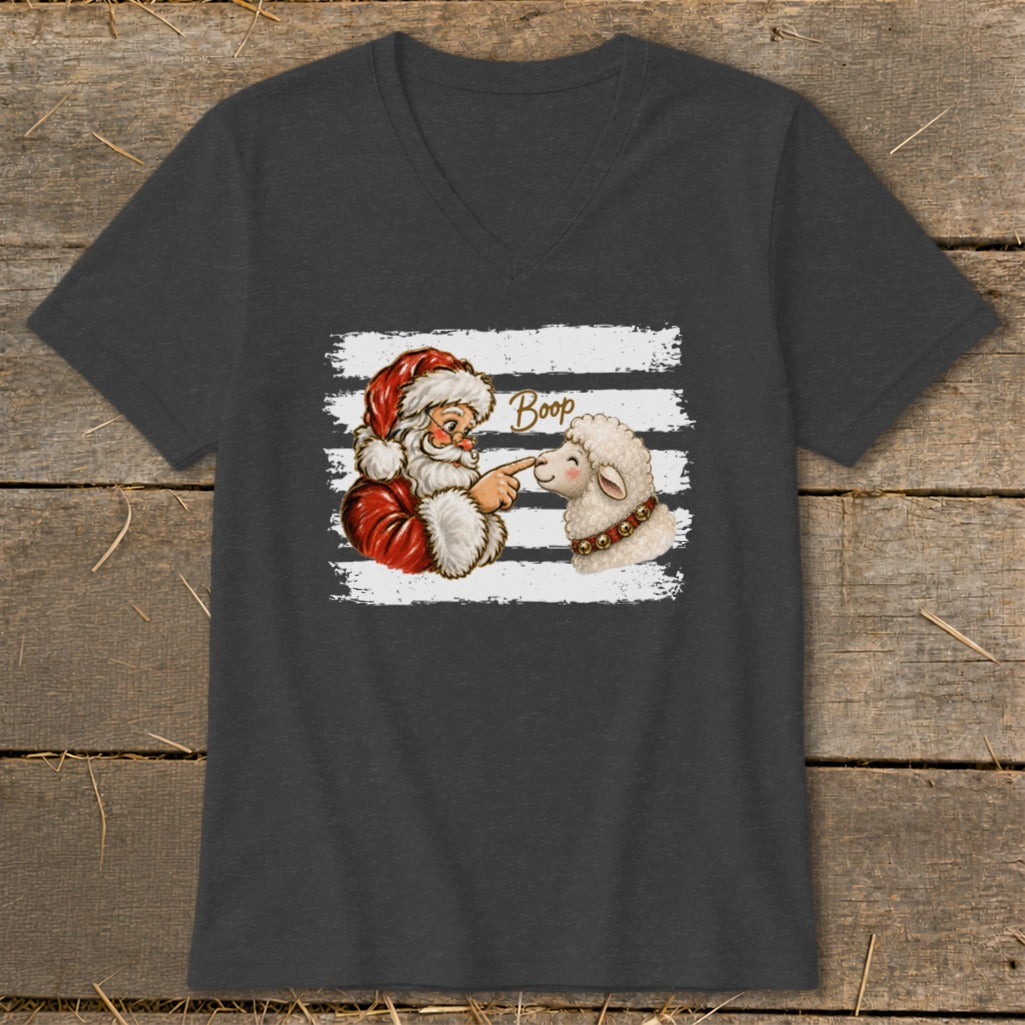 Santa booping a sheep with the word "Boop" above.
