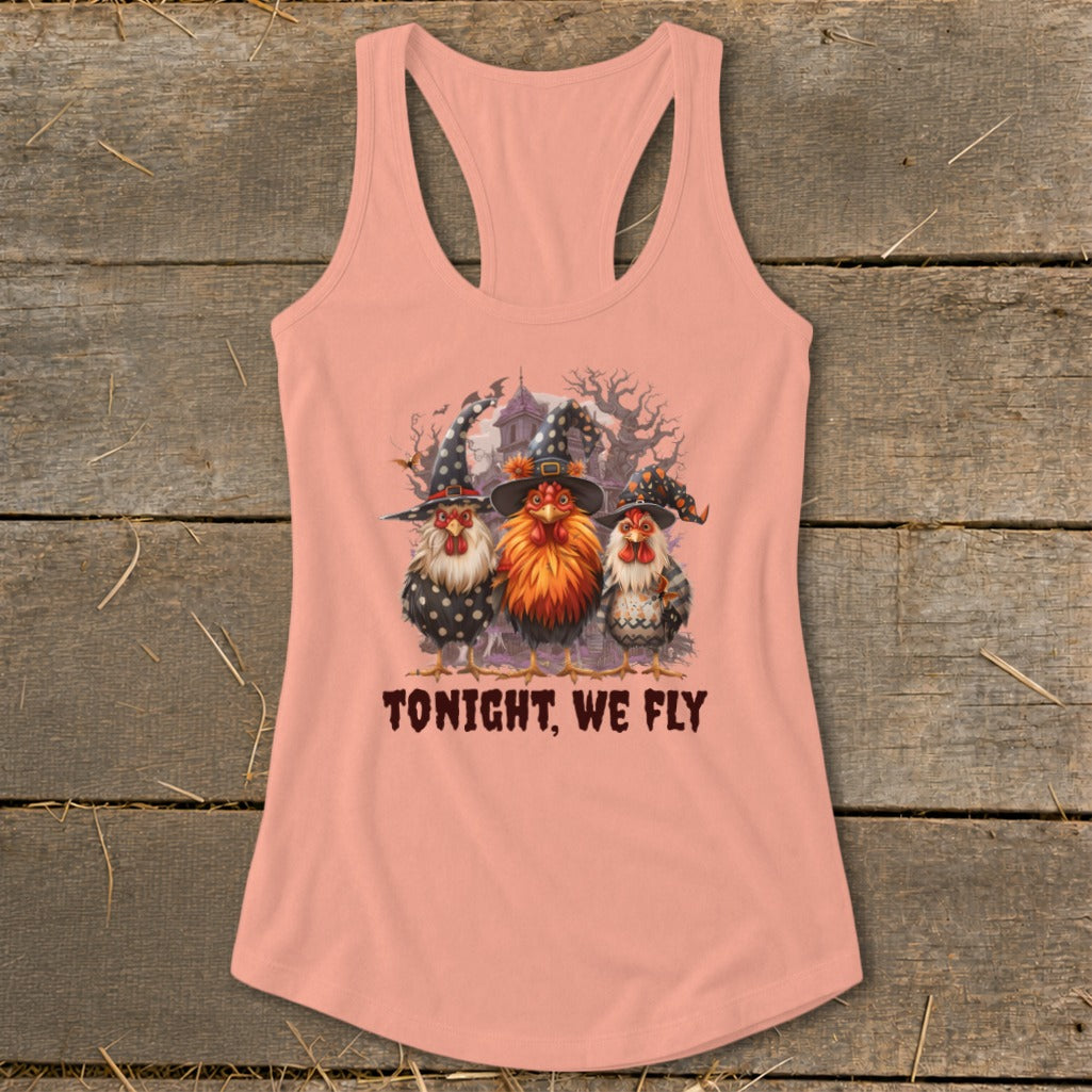 Three chickens in witch hats and a spooky house. "Tonight, We Fly" text.