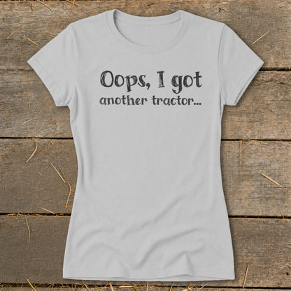 Light gray t-shirt with "Oops, I got another tractor..." text.