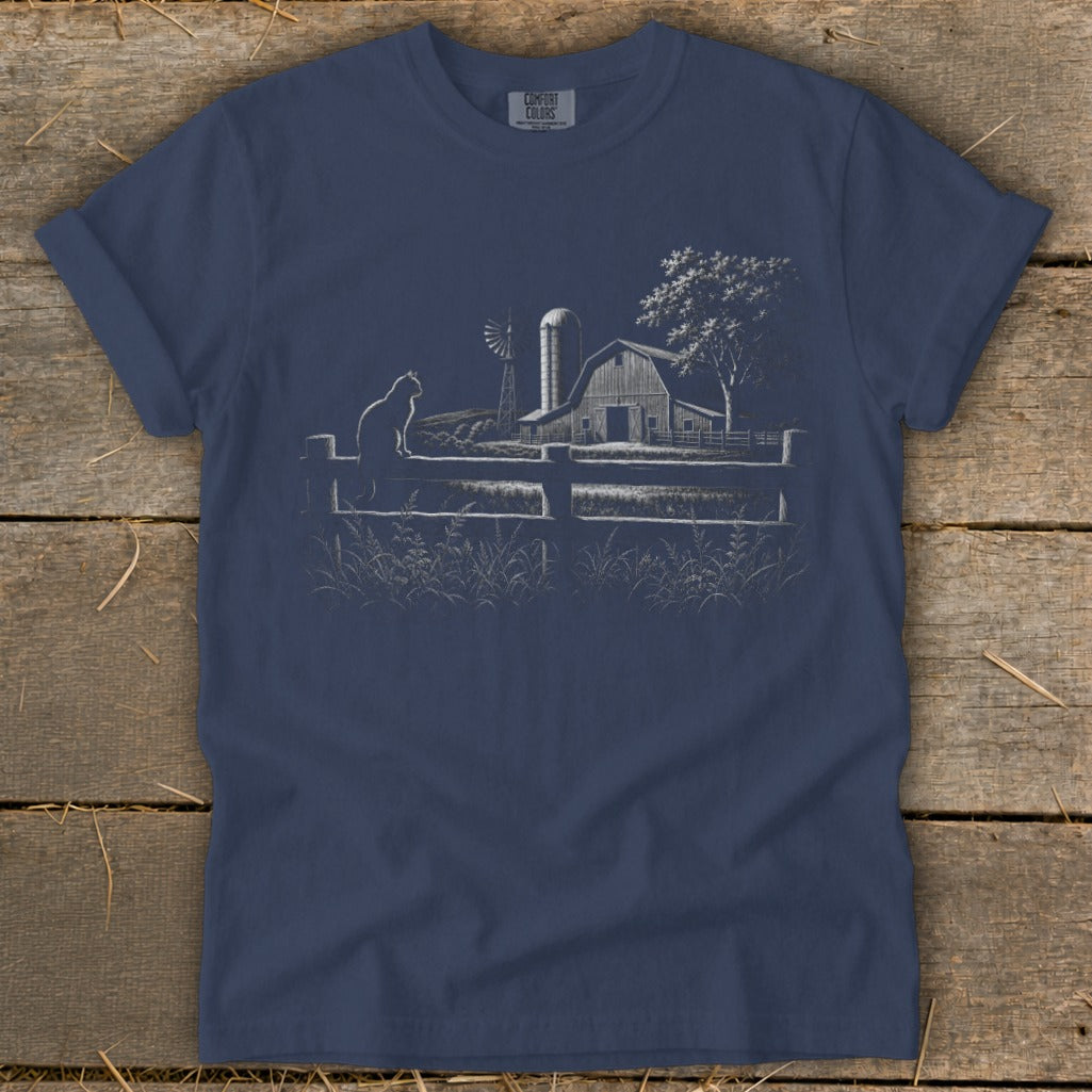 Barn scene with cat on fence and windmill on navy blue t-shirt.