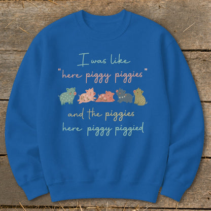 Blue sweatshirt with cute pigs and text "I was like 'here piggy piggies' and the piggies here piggy piggied".