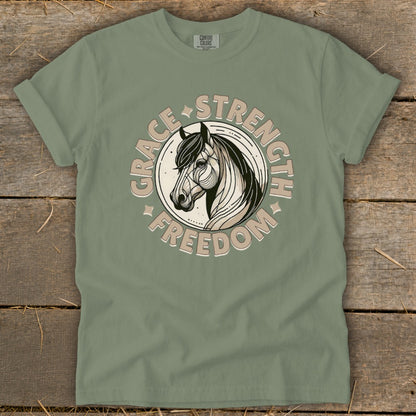 T-shirt with horse head illustration and text GRACE STRENGTH FREEDOM.