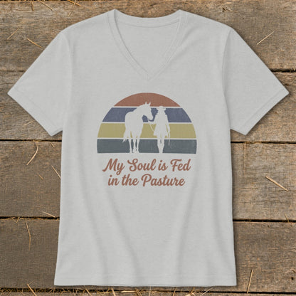 T-shirt with horse and person silhouettes, sunset, and text "My Soul is Fed in the Pasture".