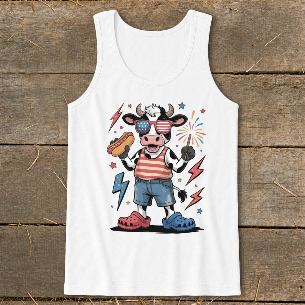 Cow with hot dog and sparkler wearing American flag sunglasses and shirt.
