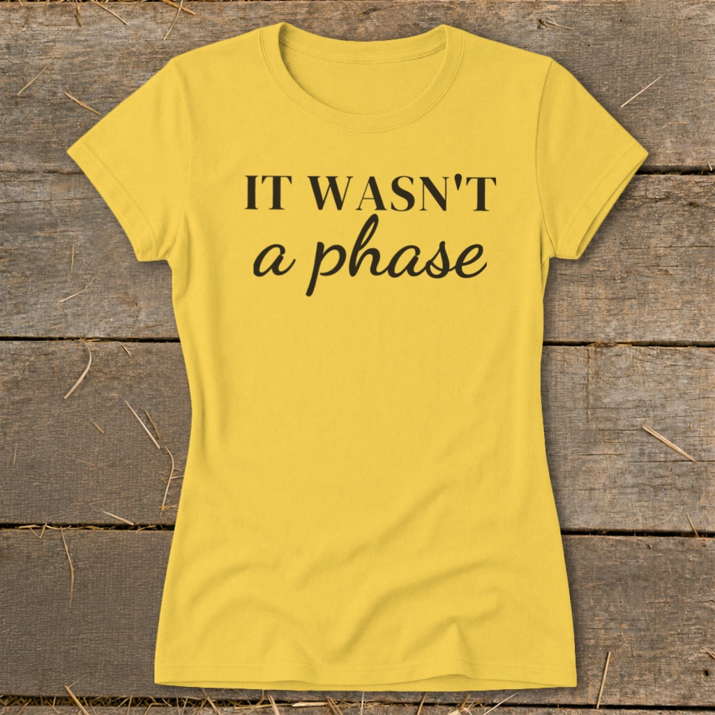 Yellow t-shirt with black text that reads "IT WASN'T a phase".
