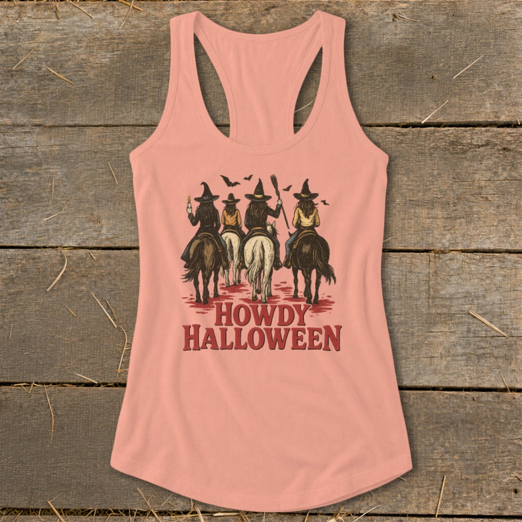 Peach tank top with witches on horses graphic and "Howdy Halloween" text.