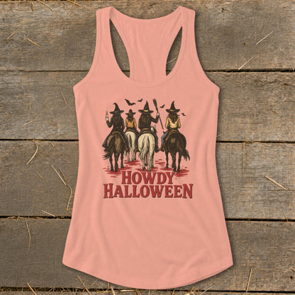 Peach tank top with witches on horses graphic and "Howdy Halloween" text.