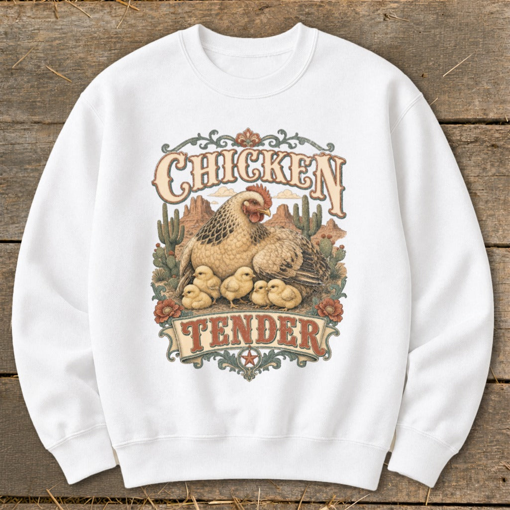White sweatshirt with "Chicken Tender" text and a mother hen with chicks in a desert landscape.