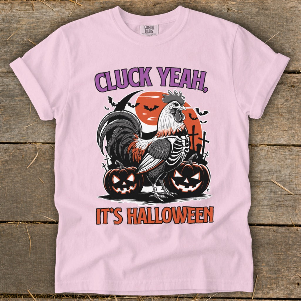 Rooster skeleton graphic with pumpkins and text "CLUCK YEAH, IT'S HALLOWEEN".