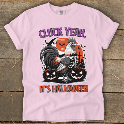 Rooster skeleton graphic with pumpkins and text "CLUCK YEAH, IT'S HALLOWEEN".